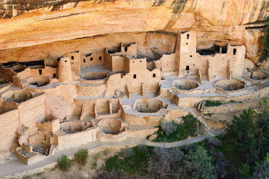 Ancient cliff dwellings at Mesa Verde National Park showcasing historic Native American architecture.